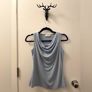 Draped light blue top